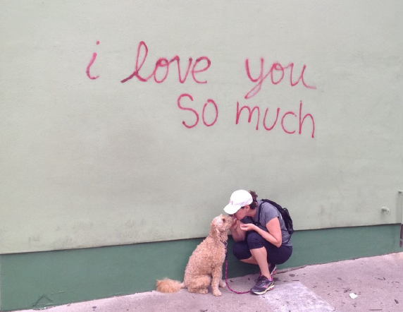 Dominique and dog Foster at the I love you so much wall in Austin, Texas 