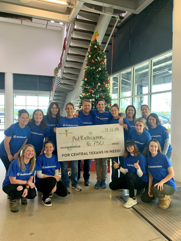 Petrelocation team volunteering with central texas food bank